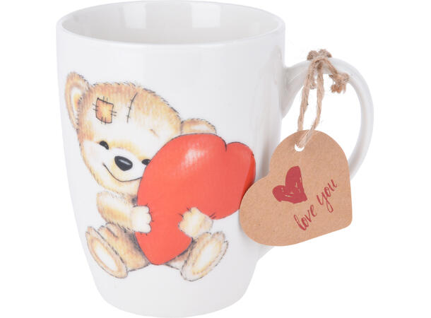 Krus porselen hvit m/bamse 12x9x11cm Volum: 330ml m/gavelapp. Forpakn.12stk 