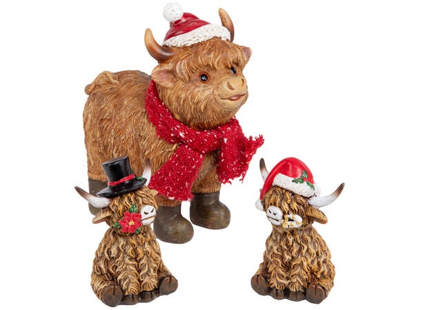 Ku oksedyr sittende m/lue/hatt 9cm 2ass 