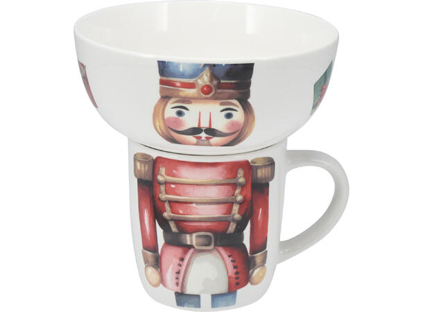 Krus og skål porselen julemotiv 4ass Forpakning: 8pk Skål:600ml Krus:360ml 